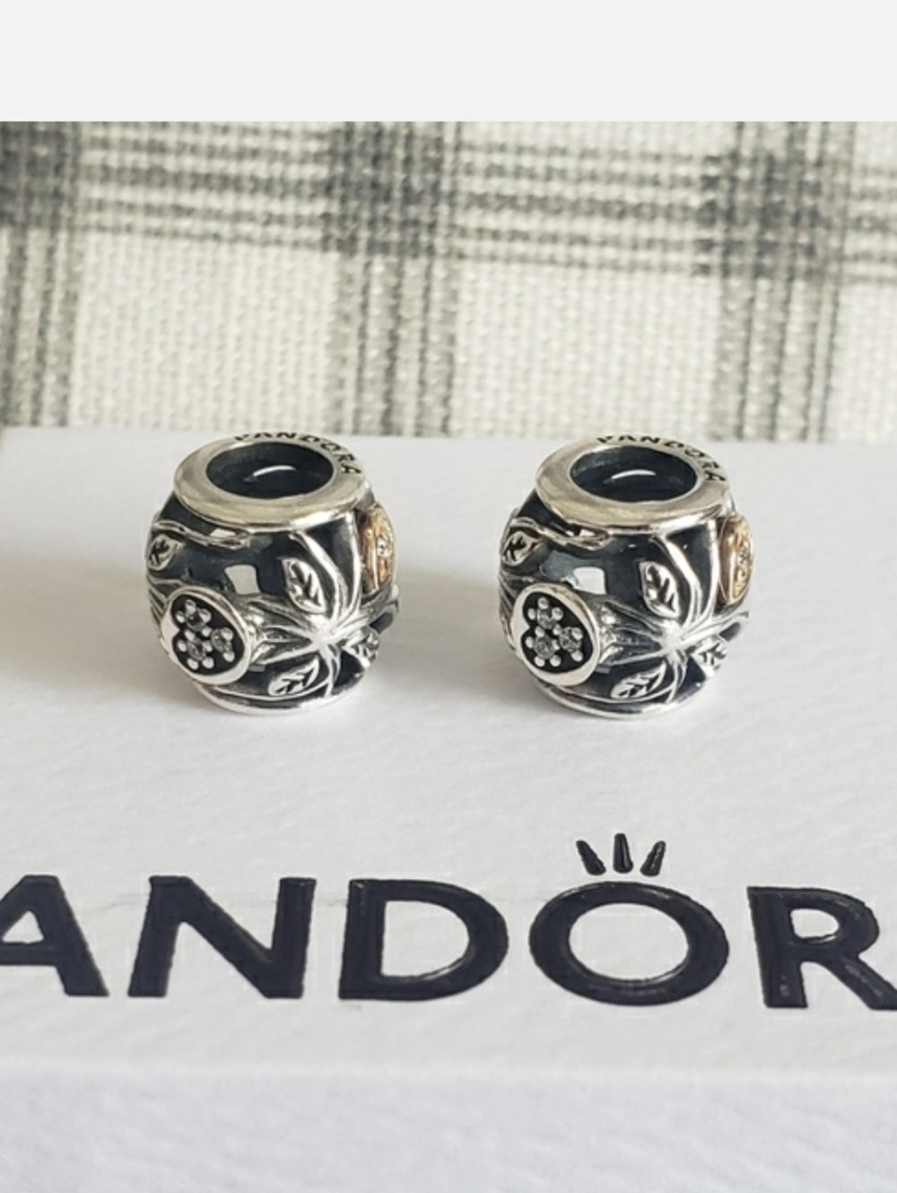 Pair of Two Tone Tumbling Leaves charms with 14k, in excellent condition.